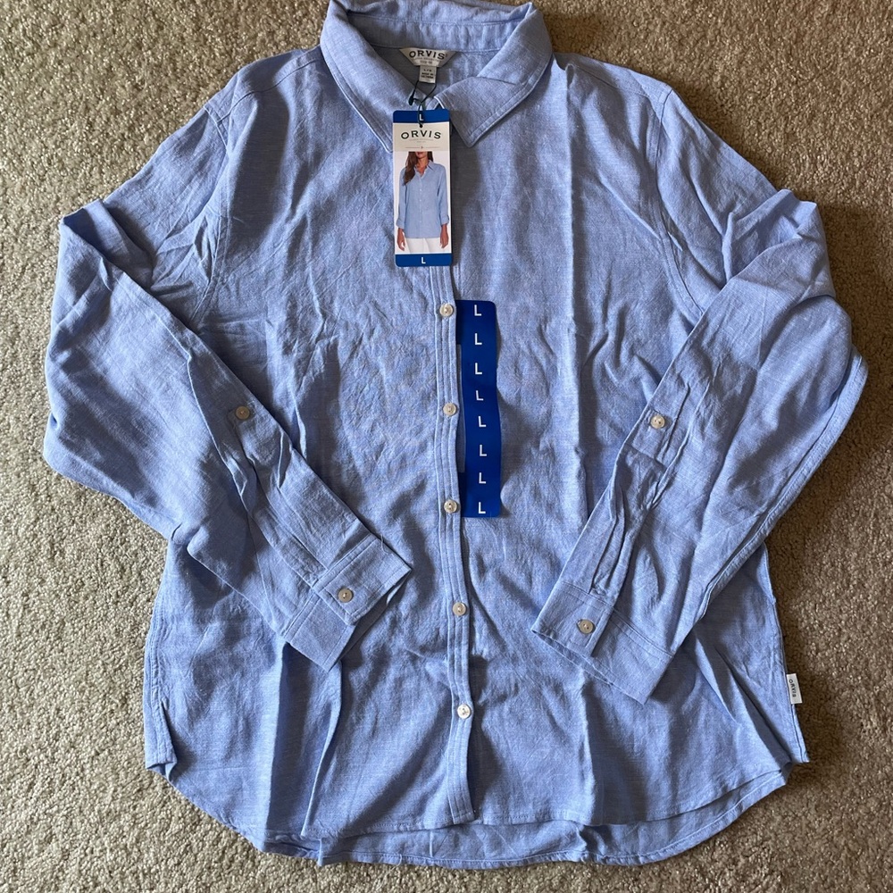 Woman’s long sleeve button down shirt